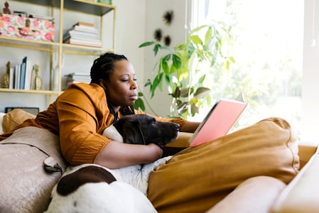 woman reading one of the best devops books available this year 